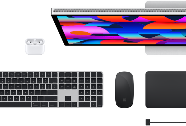 Top view of Mac accessories: Studio Display, AirPods, Magic Keyboard, Magic Mouse and Magic Trackpad